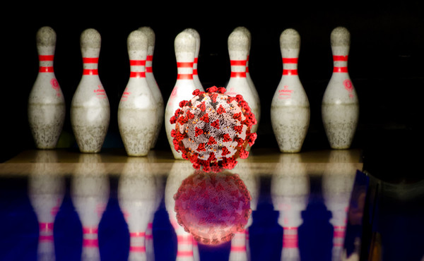 Bowling ball going towards pins. Photo by Peter Heeling (goodfreephotos.com) illustration FBL