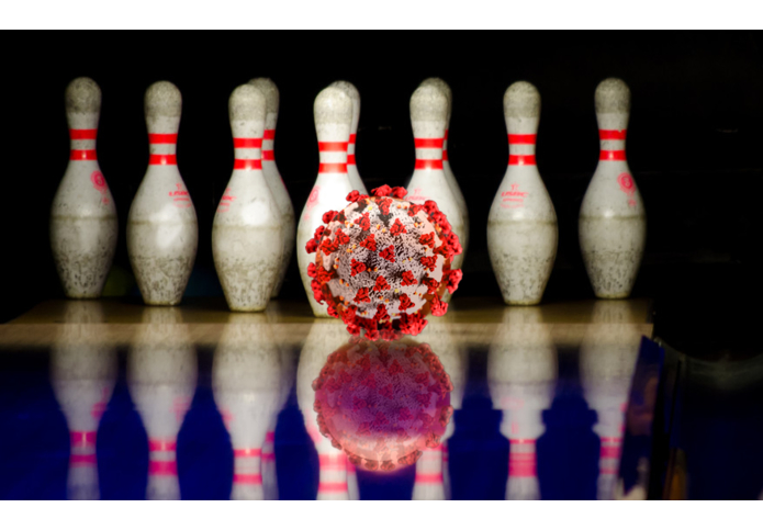 Bowling ball going towards pins. Photo by Peter Heeling (goodfreephotos.com) illustration FBL